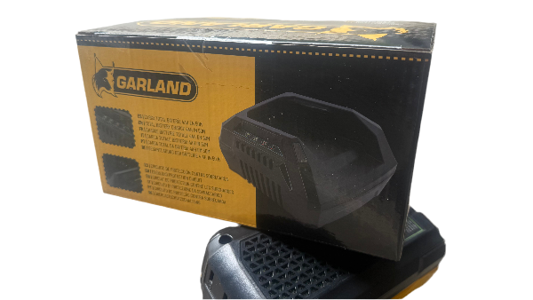 Garland 602W artificial turf sweeper showing 40L collection bag capacity and steel frame