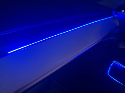 Close-up of a car's interior with blue LED strip lighting on Tesla BSD. #myteslaaccessoriesau