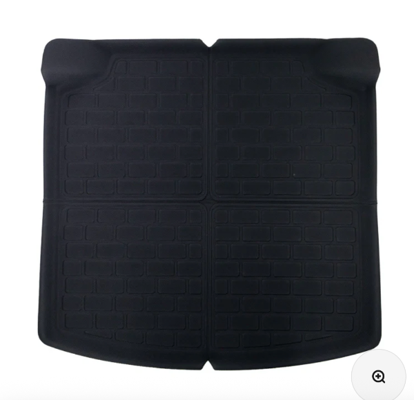 Black BYD SeaL boot mat with textured surface on a white background