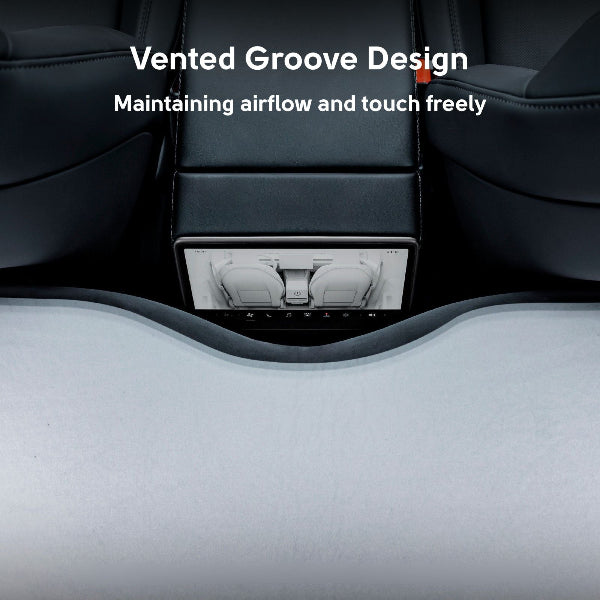 Tesla car interior with a vented groove design in the mattress to show how screen is feature highlighted.
