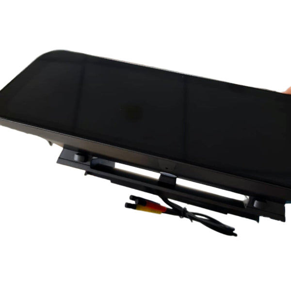 Tesla 9.6" vented dashboard display with a digital display showing various icons and information.